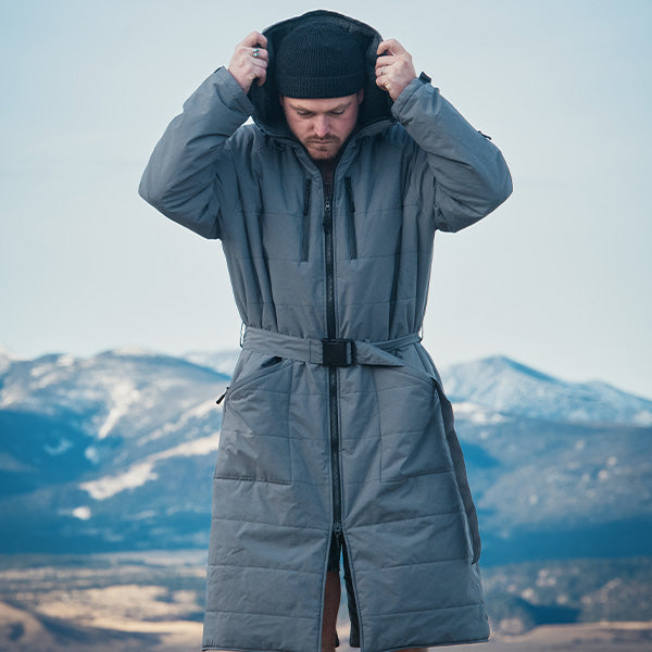 Guy wearing a hooded Alpine Robe